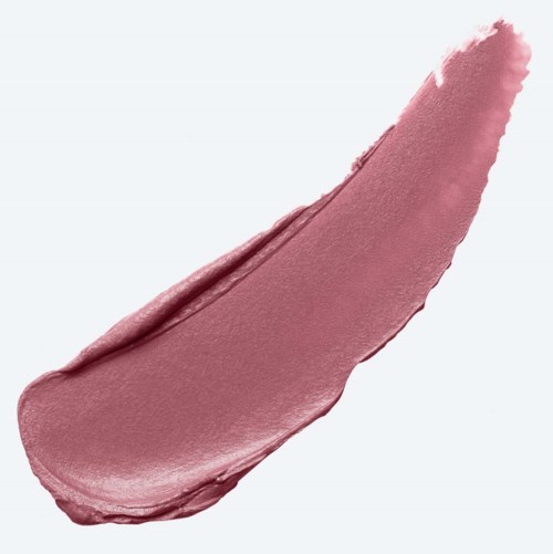 Ett stänk av rosa läppstift eller kosmetikaprodukt på en ljus bakgrund.