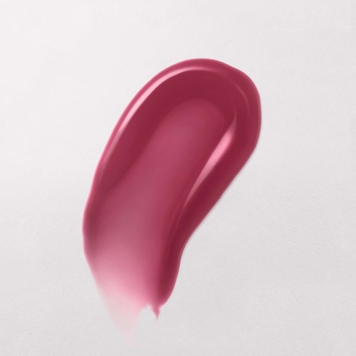 Et rosa, buet objekt med glatt overflate, muligens et personlig pleieprodukt, på en lys bakgrunn.