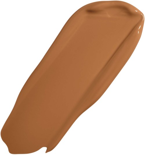 Sävyttävä meikkivoide tai pohjusteputki, jossa on kallellaan oleva applicatoripää.