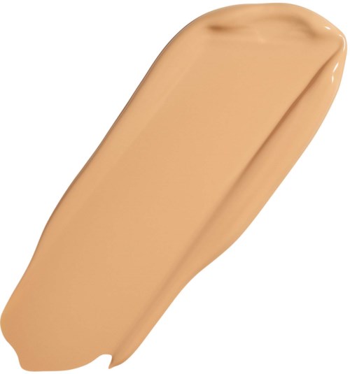 Beige neste nestemäinen meikkivoidelevy tai näyte, sileä tekstuuri.