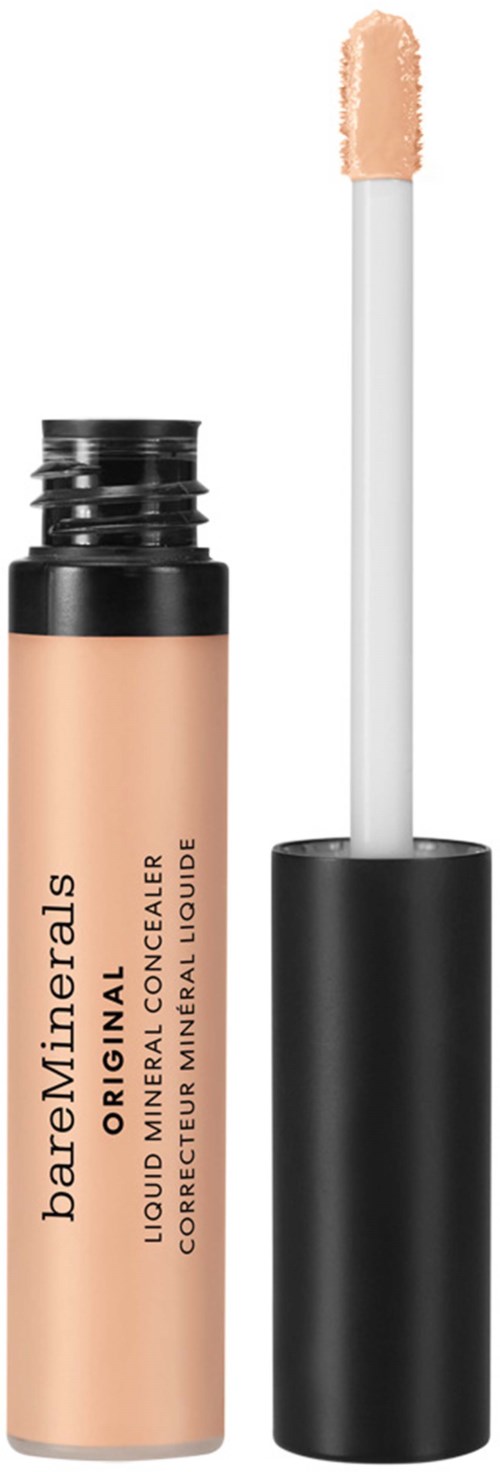 En beige vätskekorrigerare med svart lock och en vit applikator. Den är märkt BareMinerals.