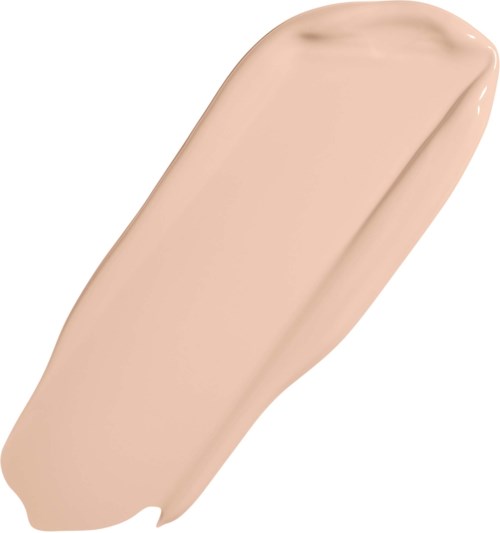 En beige sminksvamp med rund form och slät yta.