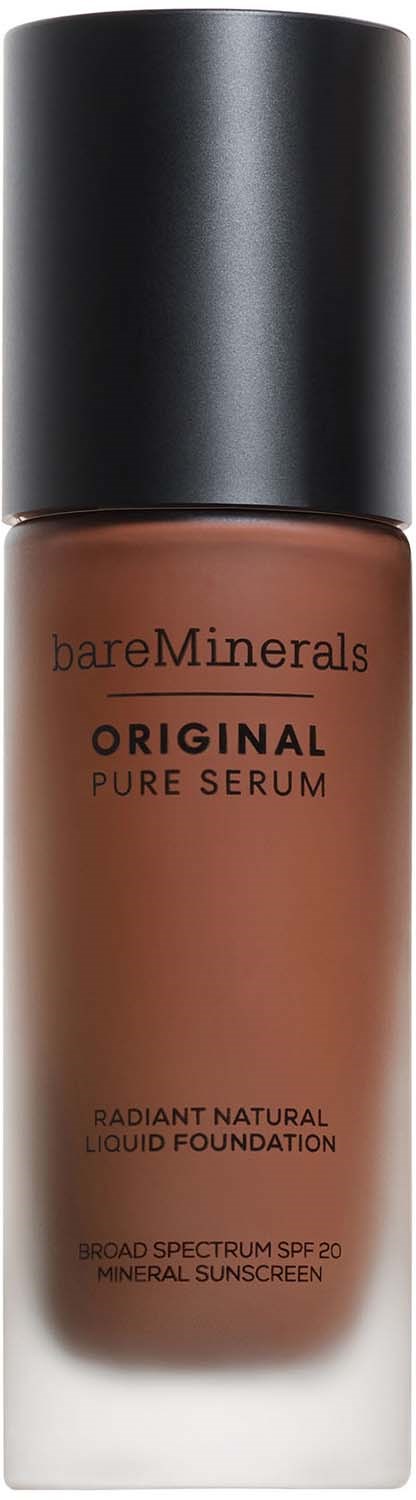 En flaska med bareMinerals makeupfoundation med svart lock och brunt vätska inuti.
