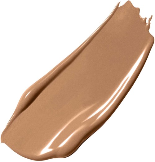 En smøre af cremet, lysbrun makeup eller foundation på en hvid overflade.