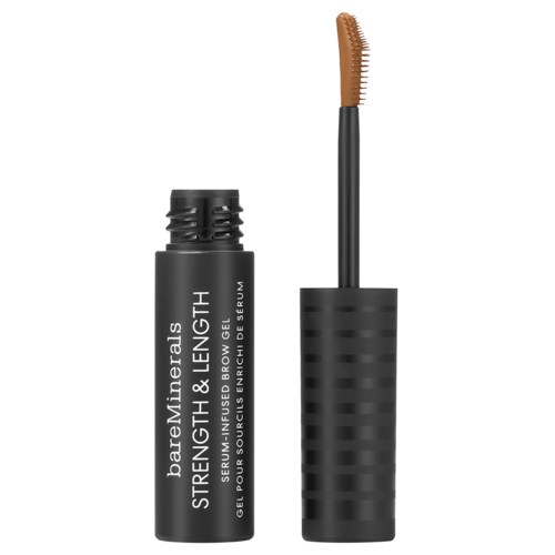 En svart tub med en borste som applicator syns. Tuben har vit text om bryn gel. Borsten är brun och krökt.