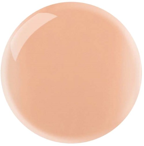 A round, smooth, light pinkish-beige lipstick with a shiny surface.