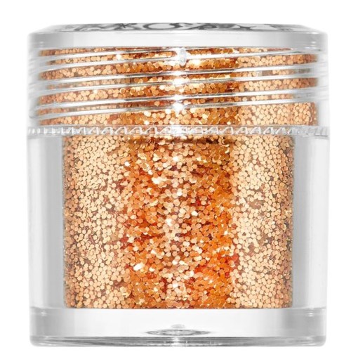 En liten genomskinlig burk fylld med glänsande, guldglittrig glitter, täckt med ett silverlock. Glittret glittrar inuti.