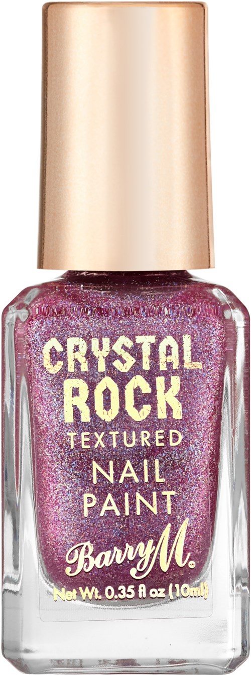En nagellackflaska med glänsande rosa glitter, ett gyllene lock och orden 'CRYSTAL ROCK TEXTURED NAIL PAINT' på.