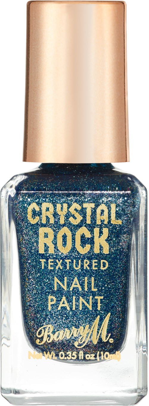 En liten glasflaska med blå glitternagellack och guldkork. Etiketten säger "Crystal Rock" och "Nail Paint".