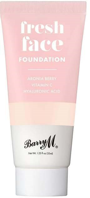 En rosa og hvit tube merket 'fresh face FOUNDATION' med nevnt aroniabær, vitamin C og hyaluronsyre.