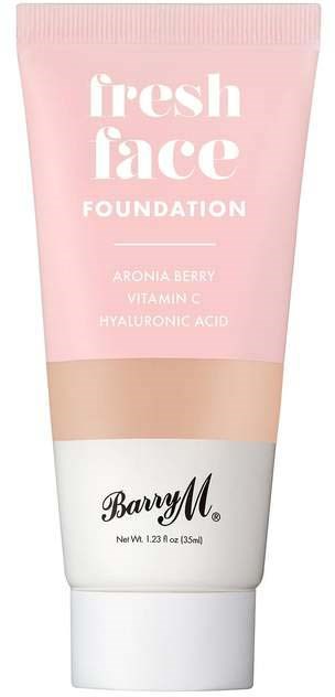 En rosa tube med ansiktsfoundation med ingredienser og merkevaren Barry M.