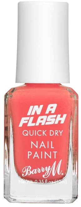 En nagellackflaska märkt 'In a Flash' med rosaaktig färg och vit kork.