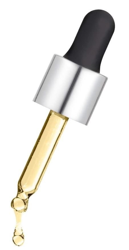 En glasdropper med svart topp släpper en droppe vätska. Droppern har en silverfärgad topp och ett guldigt rör.