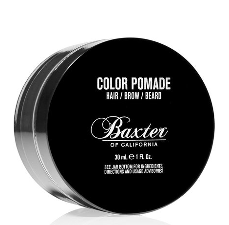 Ett svart lock till burk med vitt text som beskriver 'Color Pomade' för hår, bryn eller skägg från Baxter.