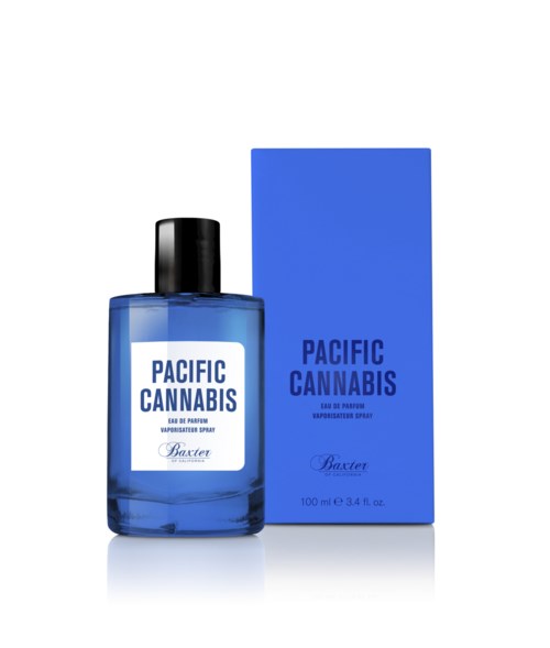 En blå parfyllflaska märkt 'Pacific Cannabis' bredvid en matchande blå låda.