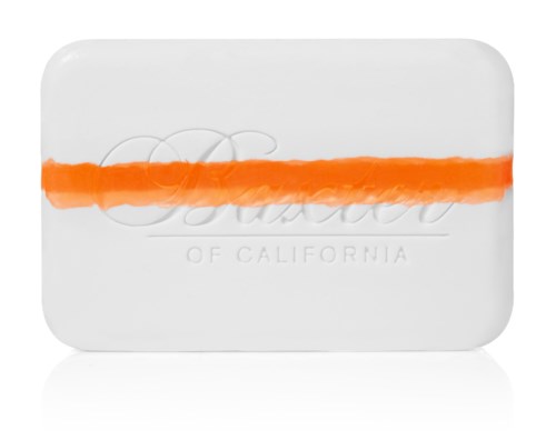 En hvit såpe med en oransje stripe, preget med ordet "Gomio" og "OF CALIFORNIA."