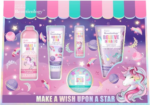 Colorful unicorn-themed beauty products, including lotion, lip gloss, and spray, with stars and planets background. The text says "Make a Wish Upon a Star."