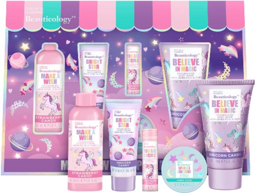 Colorful unicorn-themed beauty products with stars and magic symbols, set against a dreamy pink, purple, and blue background.