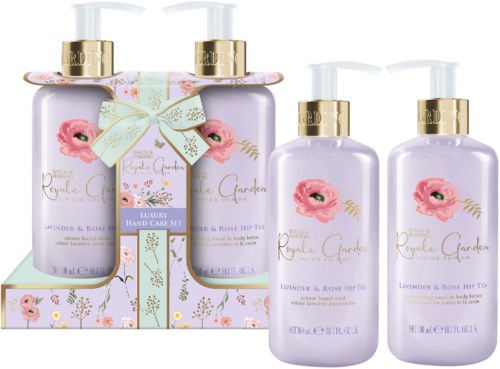 Een set lavendel en rozen handverzorgingsflessen met bloemenontwerp en gouden doppen, inclusief twee grote flessen en een geschenkverpakking.