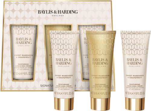Set of four gold and white tubes of Baylis & Harding lotion with a white and gold box behind.