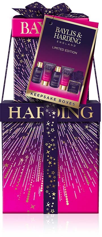 A colorful gift box with a ribbon, containing bath products and a card for a holiday celebration.