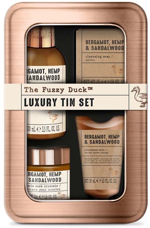 A set of skincare products with bergamot, hemp, and sandalwood in a copper-colored box.
