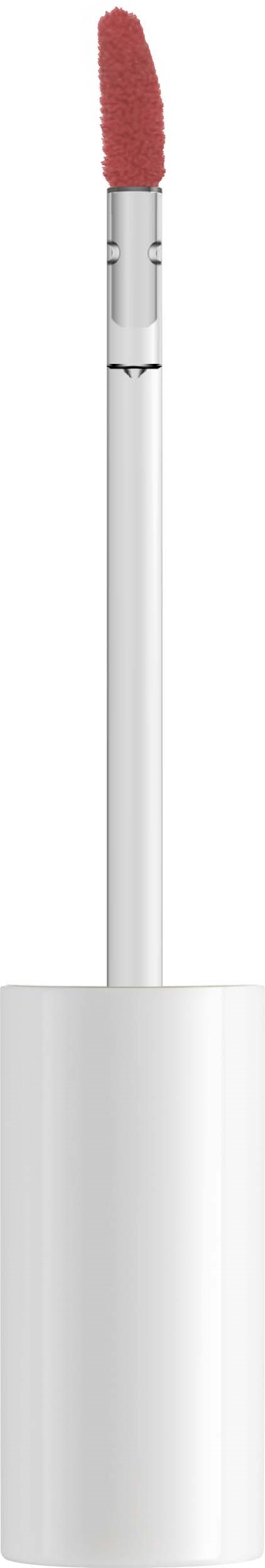 A lip gloss with a white handle and a pinkish-brown applicator tip.