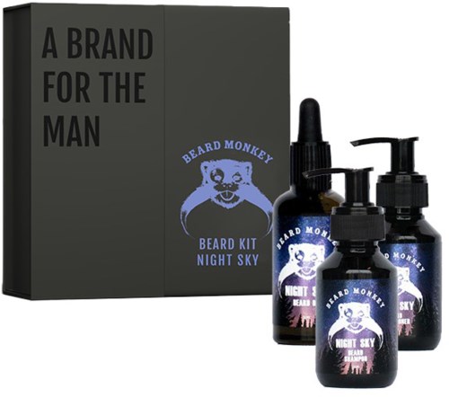 En mørk boks med teksten 'A BRAND FOR THE MAN' og tre flasker med skægplejeprodukter med bjørnelogo.