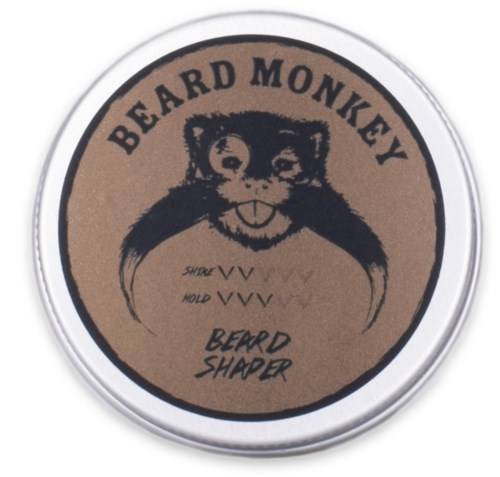 En cirkulär etikett med ett skäggbeardaparty ansikte, texten 'Beard Monkey' och en skäggformare med kryssmarkeringar.