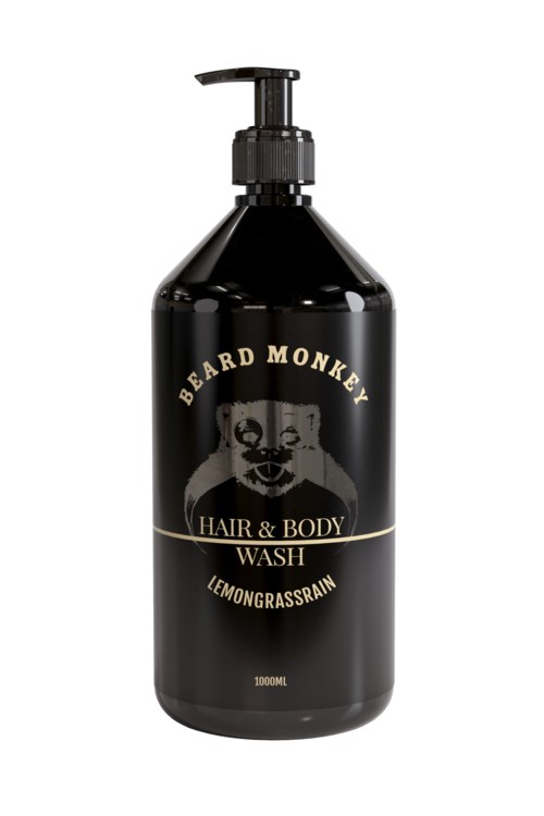 Een zwarte fles met pomp, gelabeld 'Beard Monkey Hair & Body Wash Lemon Grass & Rain' met aanvullende tekst.