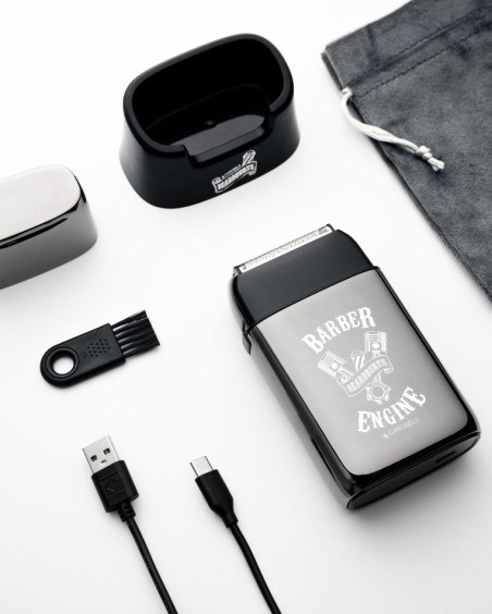 A collection of grooming tools, a shaver labeled "Barber Engine," a charging cable, a cleaning brush, and a gray pouch.