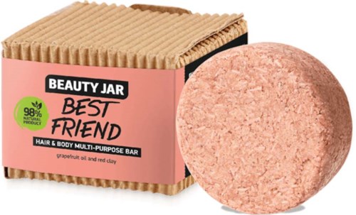 A pink and brown soap bar placed next to its box, labeled 'Best Friend' for hair and body, with natural ingredients.