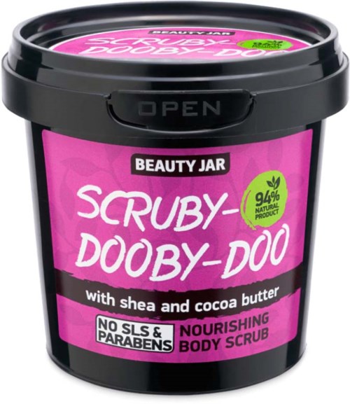 A pink and black container labeled 'Scrub-Doby-Doo' with shea and cocoa butter, promoting natural ingredients and no harmful chemicals.