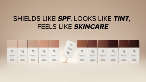 Product boxes are arranged with a slogan about sunscreens that look like makeup but feel like skincare.