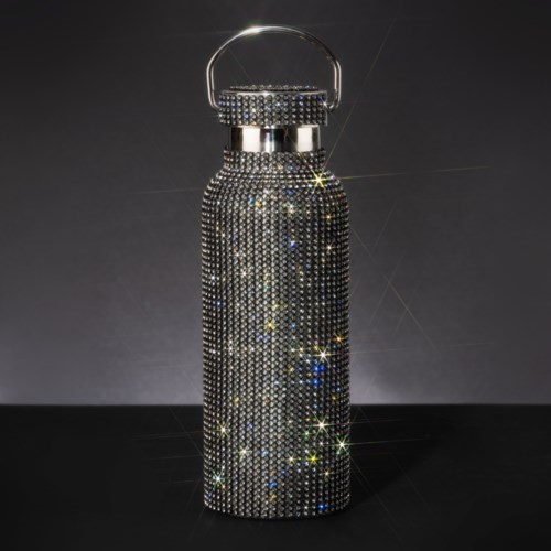 A water bottle covered in shiny, sparkling rhinestones with a handle on top.