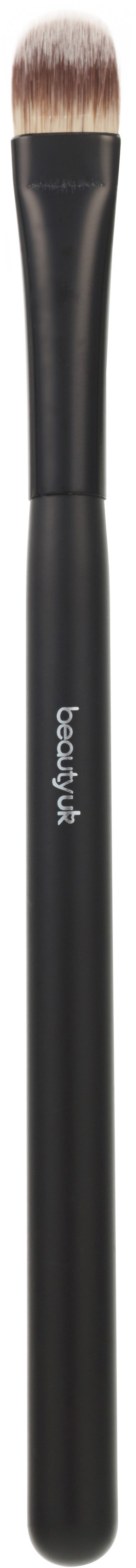 En makeup-børste med sort skaft og beige børstehår, designet til makeup-applikation.