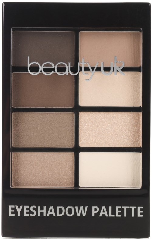 En ögonskuggspalett med sex olika nyanser i ett svart fodral, märkt 'beauty uk' och 'EYESHADOW PALETTE'.