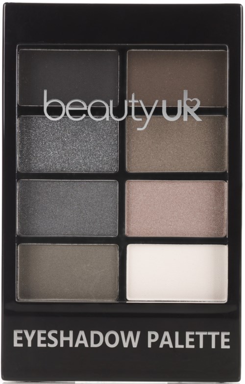 En ögonskuggspalett med sex olika nyanser i ett svart fodral, märkt 'beauty UK'.