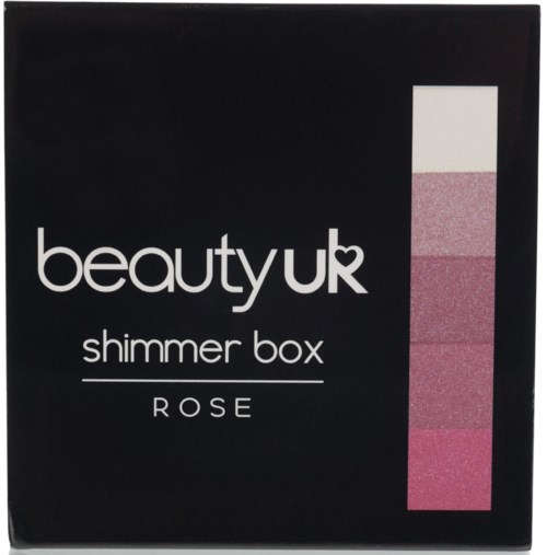 Svart yta med rosa och vita färgprov på höger sida, märkt 'beauty uk shimmer box ROSE'.