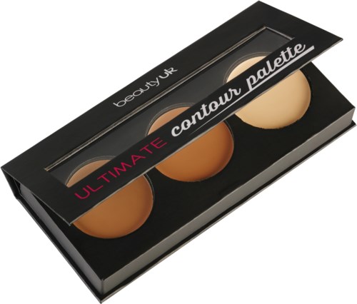 En svart sminkpalett innehåller fyra äggskalfärgade, beige, medium och mörka foundations nyanser.