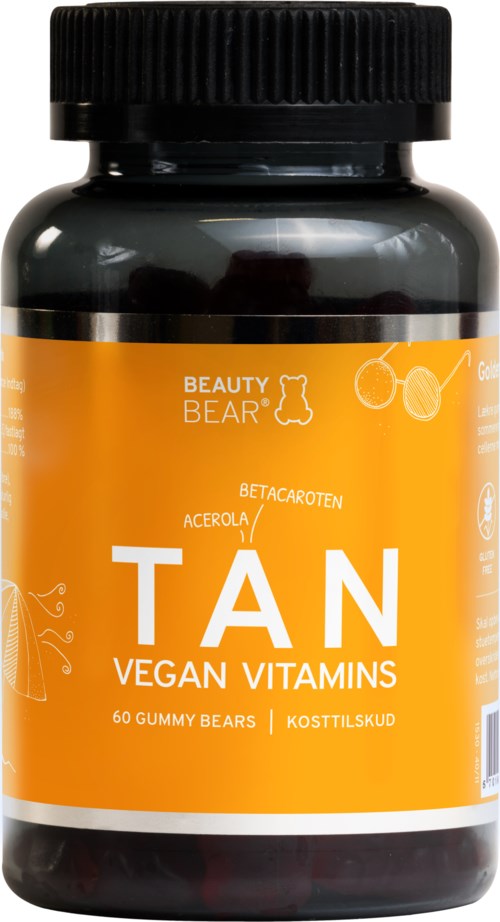 En svart flaska med orange etikett som säger 'TAN VEGAN VITAMINS' och bilder av körsbär och körsbär.