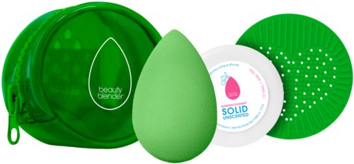 A set of green and white beauty sponge and accessories, including a sponge holder and cleaning stand.