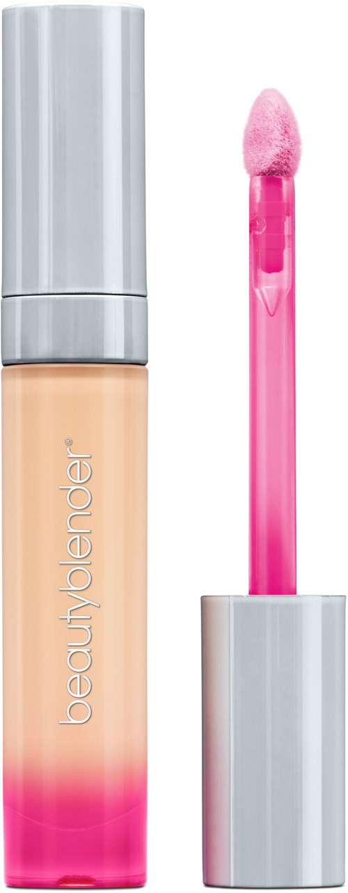 En beige flytande foundation i en flaska med en rosa gradient, och en rosa applikator med svampspets.