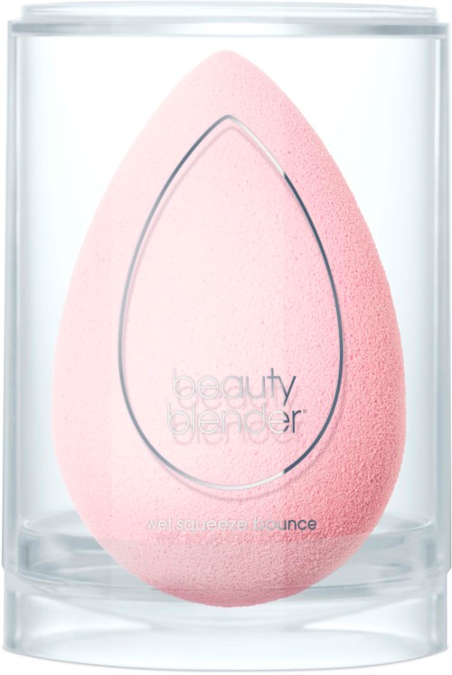 En rosa beauty blender-svamp i etglasskrukke med etikett og konturdesign.