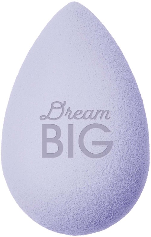 A light purple makeup sponge with the words "Dream BIG" written on it.