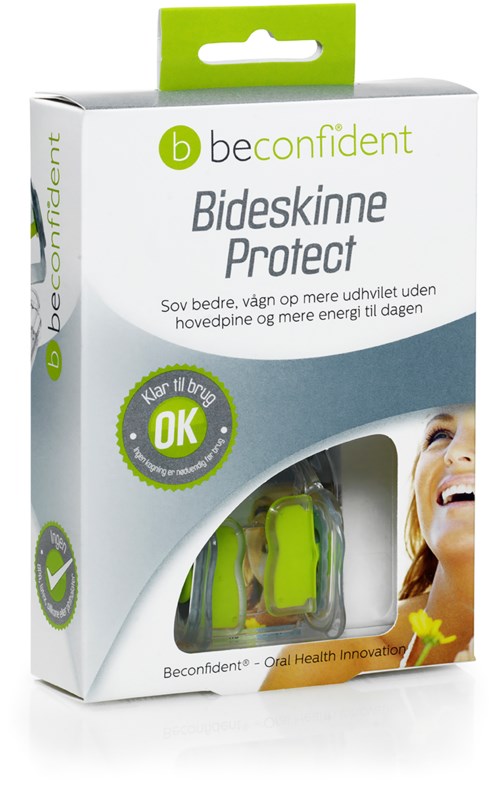 Kuva Beconfident Bideskinne Protect suusuoja-rasteista, hymyilevä nainen ja vihreä ja valkoinen pakkaukset.