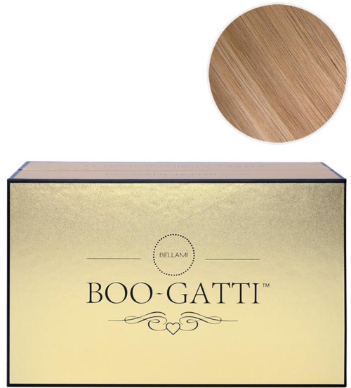 En beige box märkt 'BOO-GATTI' med en liten cirkulär logga och dekorativa linjer, och en träaktig cirkel.
