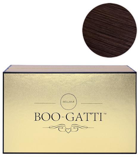 En guld- och svart låda med orden "BOO-GATTI" och dekorativa linjer och hjärt-symboler.