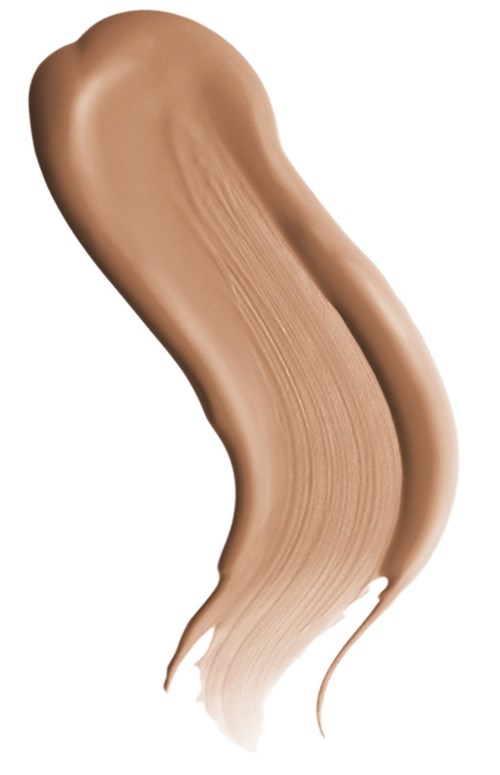 Dikke streaker van beige vloeistof, waarschijnlijk foundation of concealer, uitgesmeerd met penseel of vinger.