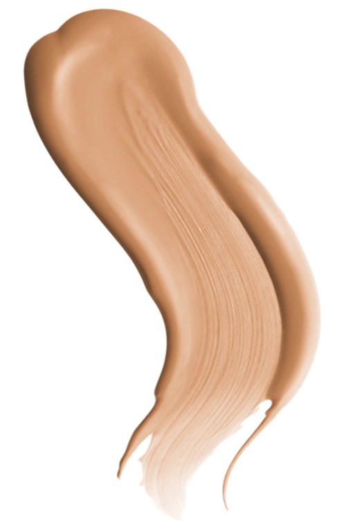 En beige makeupgrundfärgssvamp i en kurvig form på en vit bakgrund.